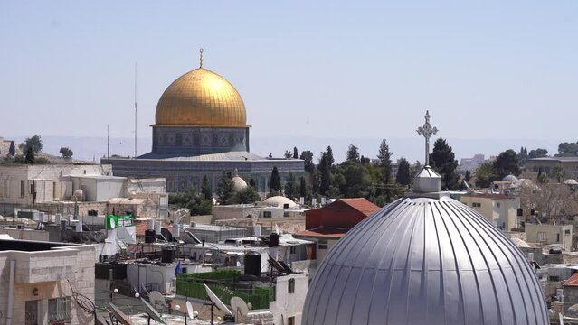 Cross of the Ecce Homo Church and Golden Dome of the Rock at Temple Mount in Background in Jerusalem - Static