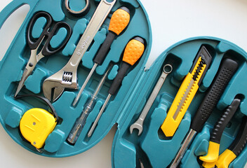 Opened oval case with tools and equipment for electrician closeup stock photo