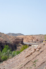 Lunar Canyon along with the Charyn River, there are many trees around. Chalk and brown mountains