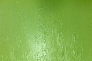 Green wall texture. Green paint on the wall. Abstract background for design
