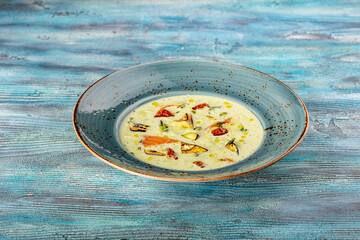 Salmon soup. Creamy hearty salmon fish soup. Clean eating, healthy and diet food concept.