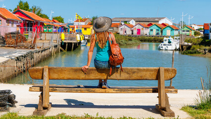 Fototapeta Colored fishing hut and boat- Tour tourism in Oleron island- France obraz
