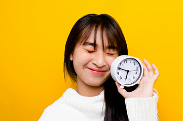 People and time. Girl and his white alarm clock. importance of time The value of time spent in life...