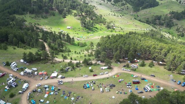 Crowded camping area within the scope of mountaineering activity