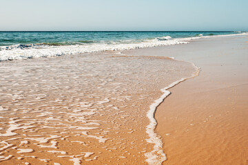 Beach and sea. Background with copy space. Sandy beach on the Canary Island of Fuerteventura, Spain.