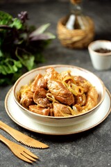 Roast pork with onions 