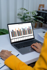 Young busy asian business woman manager, lawyer doing bookkeeping audit graph documents checking Bank Reconciliation, Base Stock, Last Invoice Price, Freight, Drop Product or Drop Section Decisions