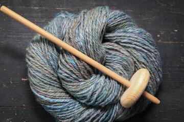 Closeup detail of a colourful skein of organic natural handspun and handdyed alpaca wool yarn...
