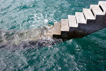 Cement stairs into the sea
