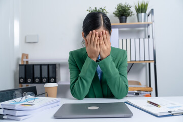 Headache, stress busy asian business woman manager, lawyer doing bookkeeping audit graph documents checking Bank Reconciliation,  Base Stock, Last Invoice Price, Discounting Notes Receivable