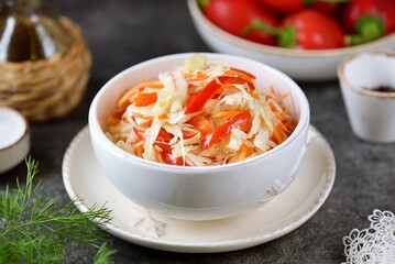 Homemade pickled cabbage with 
bell peppers, carrots and onions.