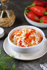 Homemade pickled cabbage with 
bell peppers, carrots and onions.