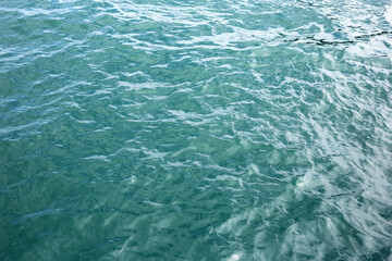 Blue sea water surface texture. Blue ocean summer