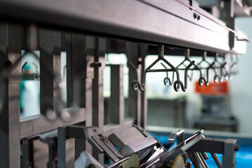 Large poultry farm processing workshop with automated conveyor systems, ensuring high-quality production, efficient packaging, and strict hygiene standards