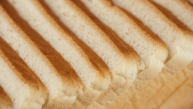 Sliced toast bread white, slider shot. Ideal traditional bread for sandwich
