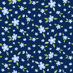 Seamless pattern of small blue flowers and green leaves on navy background. Floral print
