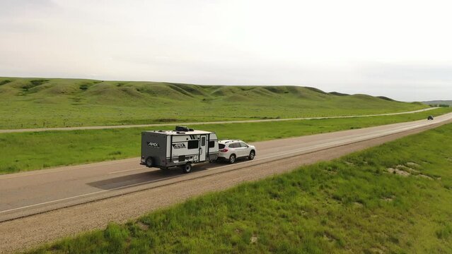  A car towing a travel trailer in Saskatchewan, Canada 