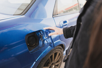 blue car gasoline door cap