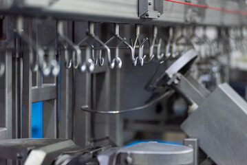 Large poultry farm processing workshop with automated conveyor systems, ensuring high-quality production, efficient packaging, and strict hygiene standards