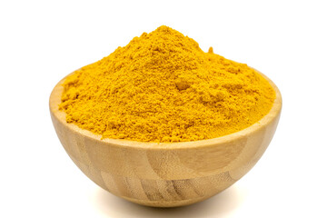 Powdered turmeric isolated on white background. Dried ground turmeric powder spices in wooden bowl. Close up