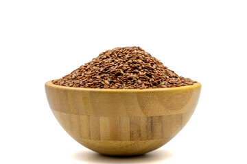 Linseed isolated on white background. Linseed or flax seed in wooden bowl