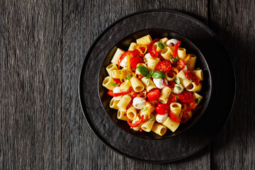 pepper tomato mozzarella pasta salad in bowl