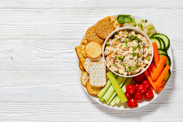 salmon salad with fresh veggies and crackers