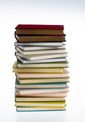 Stack of books on white background