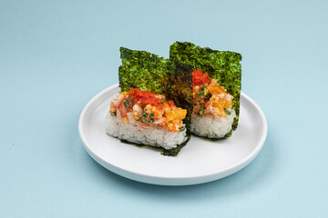 Portion of japanese hand rolls with shrimp and caviar