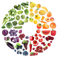 Doughnut shape made of many fresh fruits and vegetables arranged in rainbow colors © New Africa