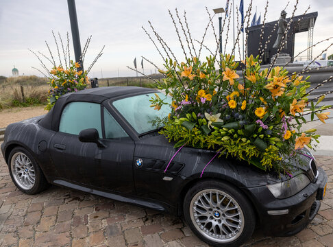  Cars decorated with flowers taking part in the Bloemencorso Bollenstreek the annual spring flower parade from Noordwijk to Haarlem in the Netherlands.