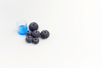 Blueberries on a white background. Space for text