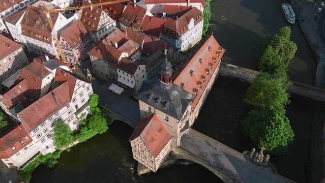 Bamberg Altes Rathaus. Aerial view of the Old town of Bamberg with the Historic Town Hall on the Regnitz river, morning