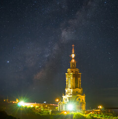 closeup christian church on night starry sky background