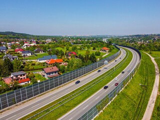 Drone view of a two-lane highway. Traveling by car