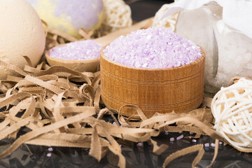 in wooden plates salt for spa procidur, close-up view