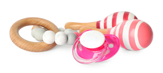 Toys and baby pacifier isolated on white