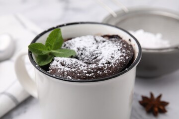 Tasty chocolate mug pie on table, closeup. Microwave cake recipe
