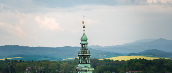 Top view of the church tower in Kłodzko. Spring landscape. - obrazy, fototapety, plakaty