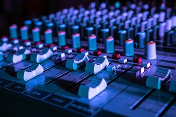 Obraz premium Close-up shot of an audio mixer in a studio