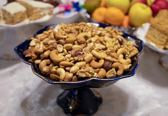 Closeup shot of mixed nuts in the vase in Yerevan, Armenia