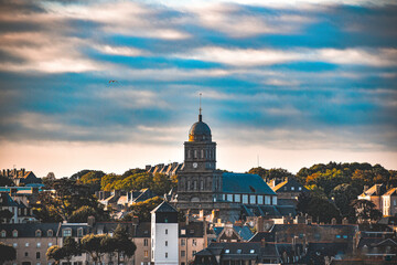 Fototapeta town city skyline townscape blue skies church spire houses obraz