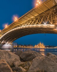 Beautiful view of Margit Bridge with lights in Budapest, Hungary at night