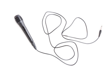 Black microphone with cable isolated on white background