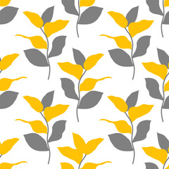 grey and yellow leaves on white background