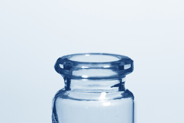 Transparent jar neck close-up with blue shades
