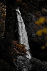 Stunning waterfall flowing into a river