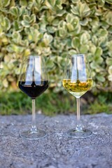 Selective of wine glasses on the concrete ground