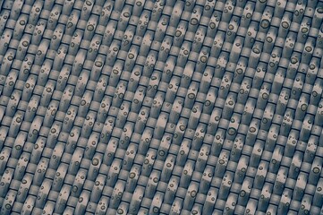 Closeup shot of a textured woven wicker surface with water droplets