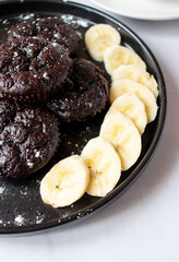 Delicious chocolate banana muffins. Dessert. On a white background